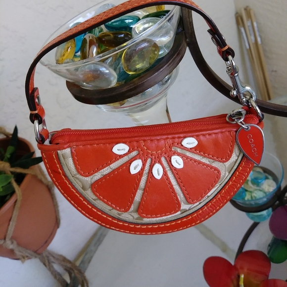 Coach Handbags - Vintage coach orange slice coin bag Wristlet 90's
